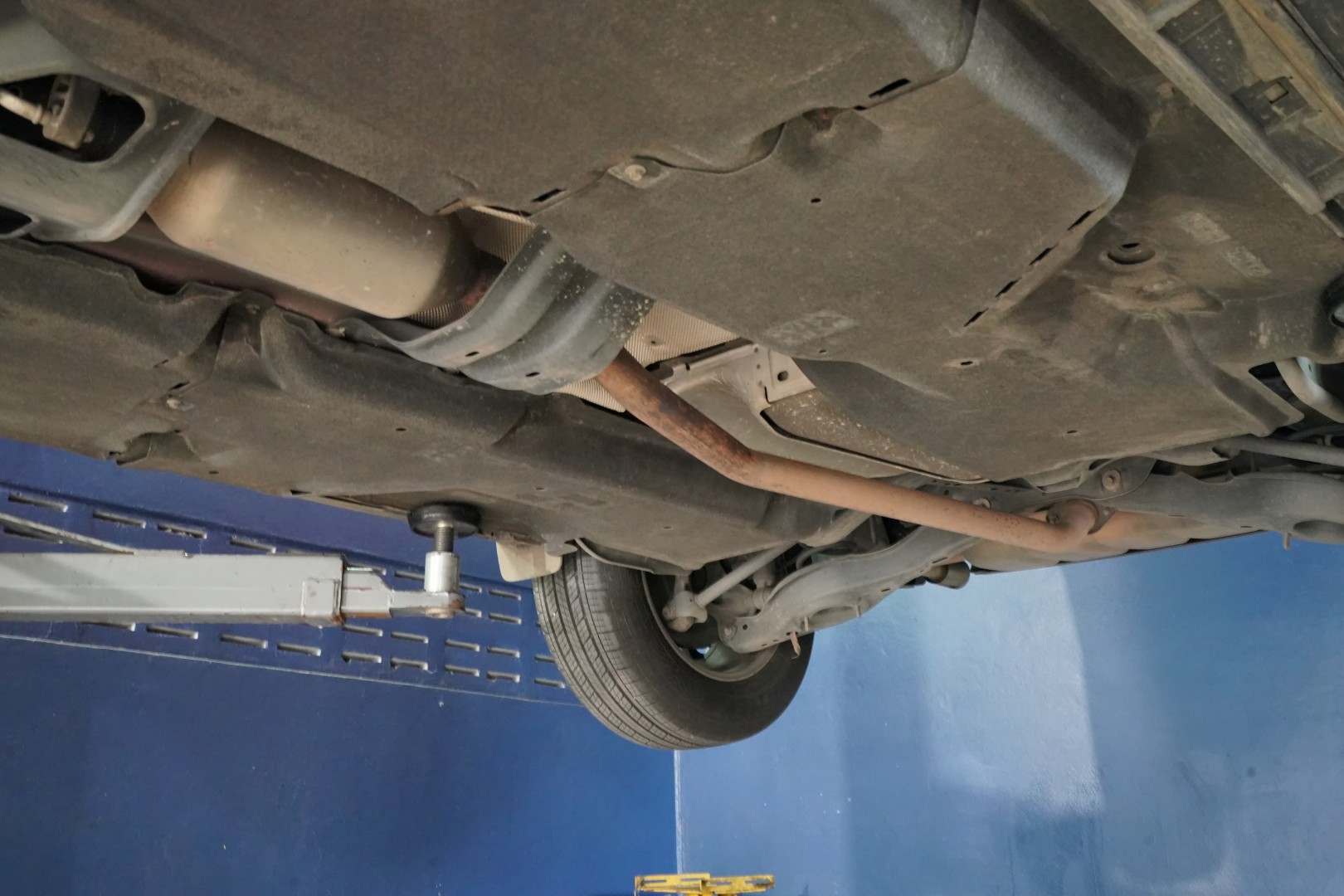 Workers changing and repair part of wheels at the car service